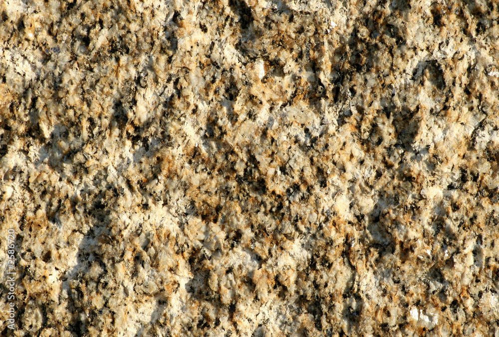 rough building granite stone surface background. rough building granite stone surface background.