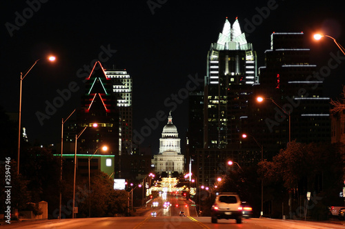 state capitol building at night in downtown austin, texas photo
