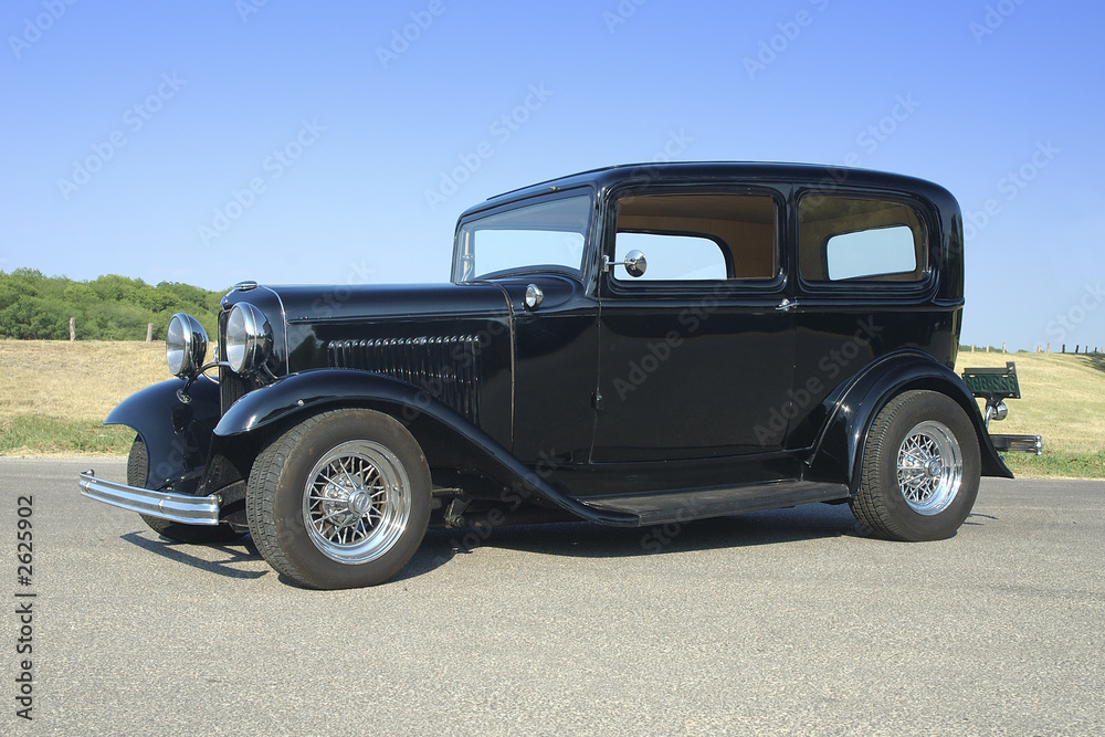 32 black sedan
