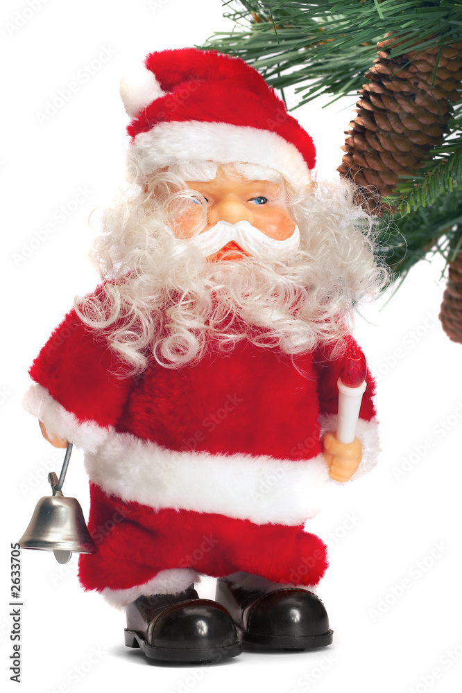 santa with a handbell in hands near a fur-tree santa with a handbell in hands near a fur-tree