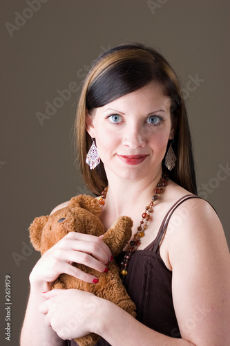 girl and teddy bear