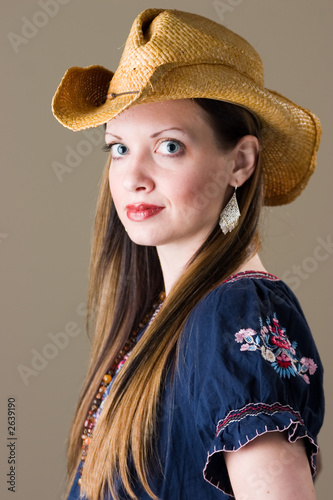 beautiful brunette in western outfit