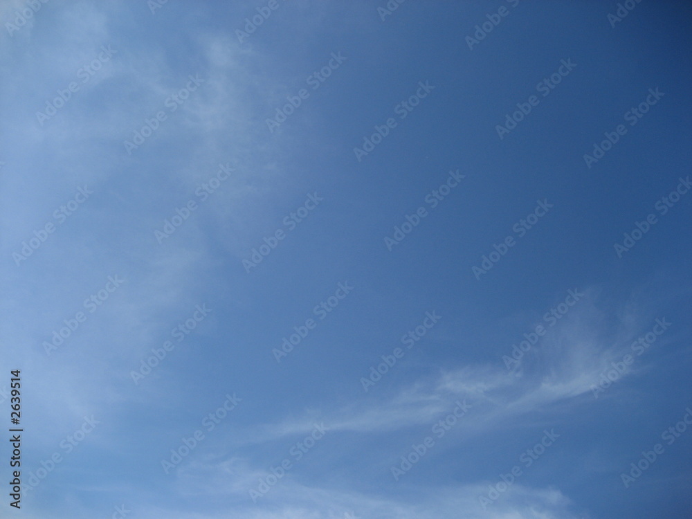 blue sky and wispy clouds