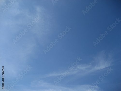 blue sky and wispy clouds