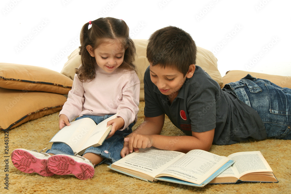 brother and sister reading books on the floor brother and sister reading books on the floor