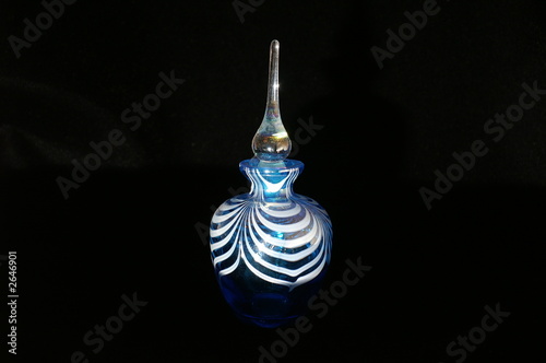 blue striped perfume bottle