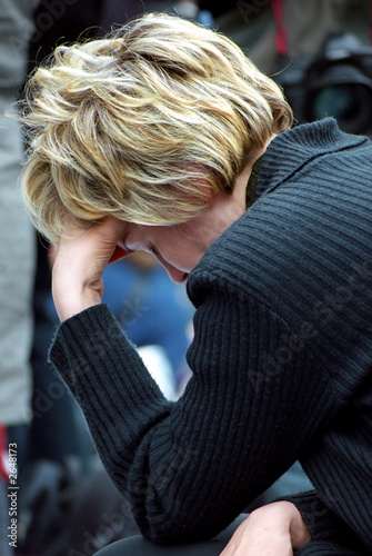 blonde woman is praying