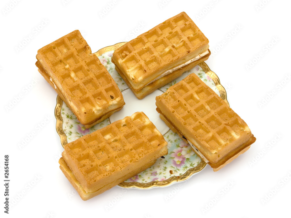 four cakes on plate four cakes on plate