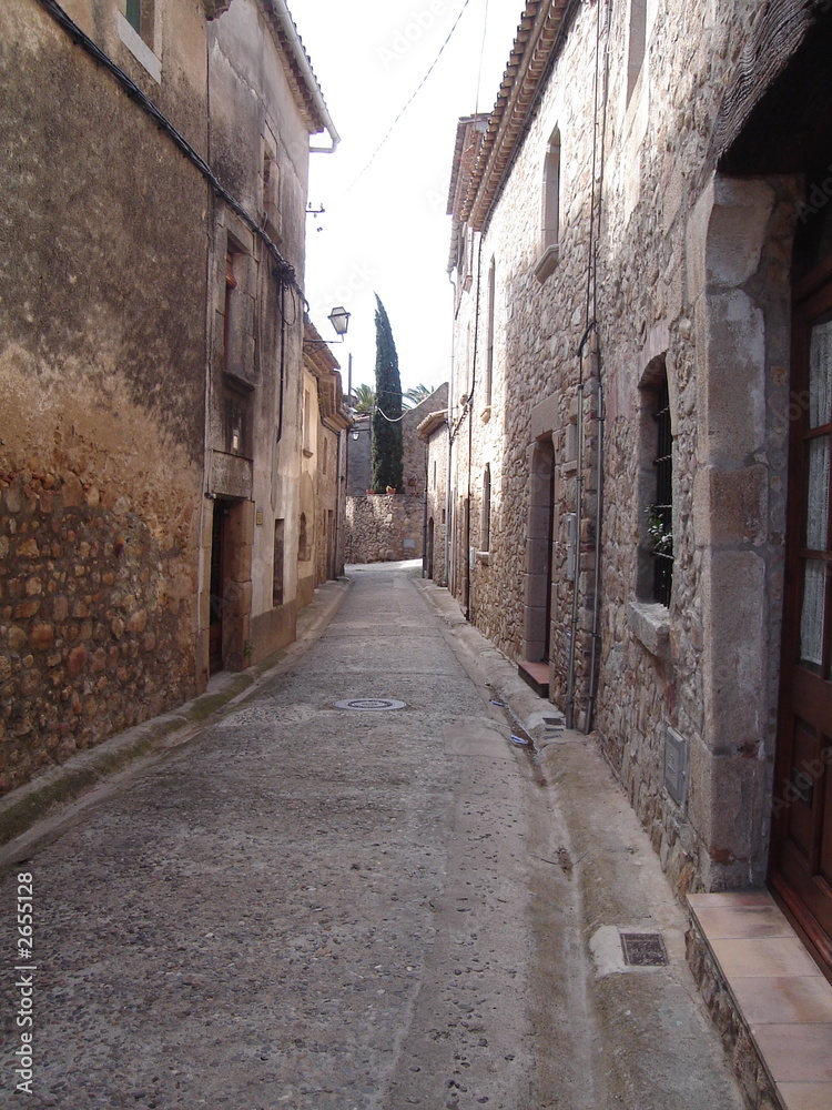 cobbled street in old castel d'aro