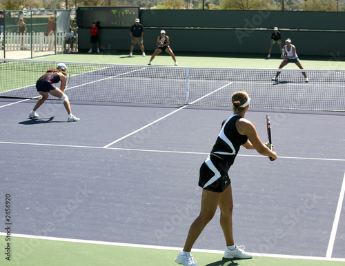 women playing doubles