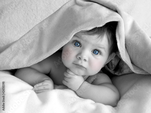 gorgeous baby under blanket