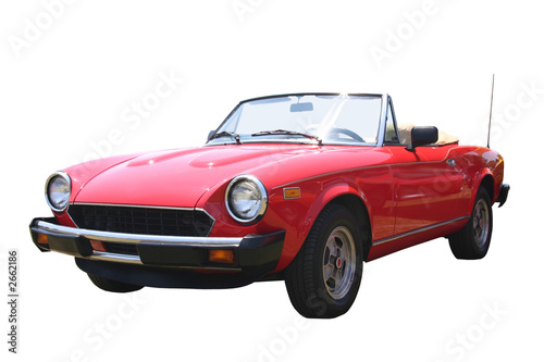 small red convertible © David Touchtone