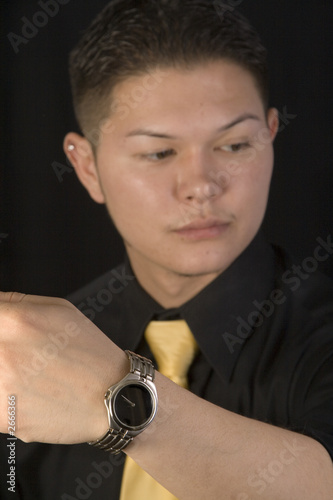 man presenting watch