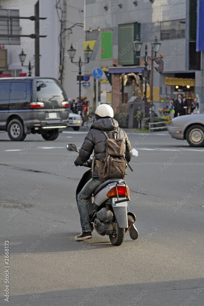 man with scooter