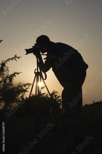 photographer in action silhouette