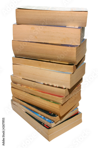 a stack of old paperback books, isolated on a whit