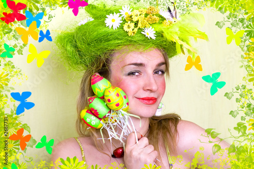 a card of spring girl with easter eggs in her hand