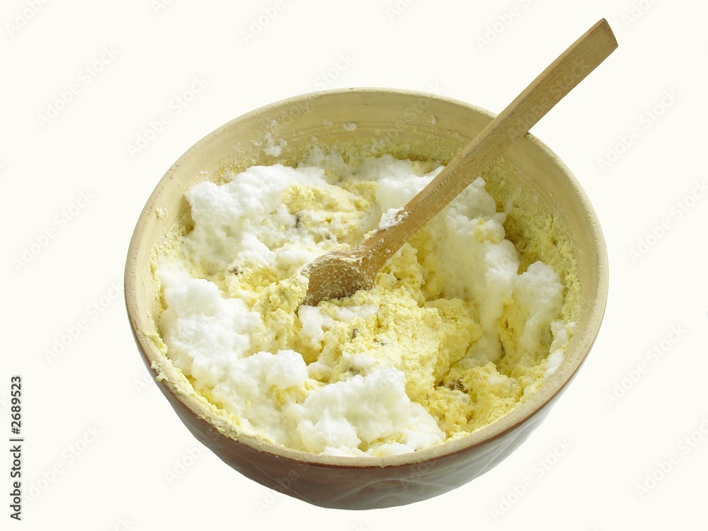 mixing cheese-mass for cheese-cake mixing cheese-mass for cheese-cake