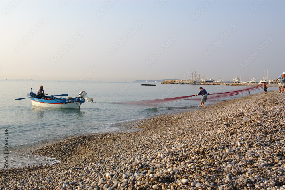 Obraz premium fishermans on a shore
