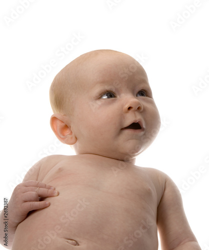 newborn looking up smiling