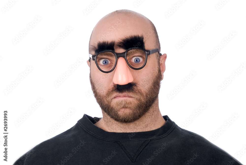 man wearing fake nose and glasses Stock Photo