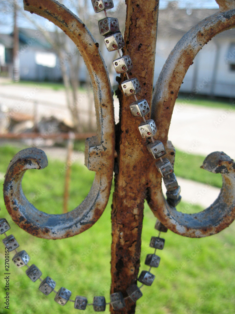 wraught iron, rust,, and mardi gras beads wraught iron, rust,, and mardi gras beads