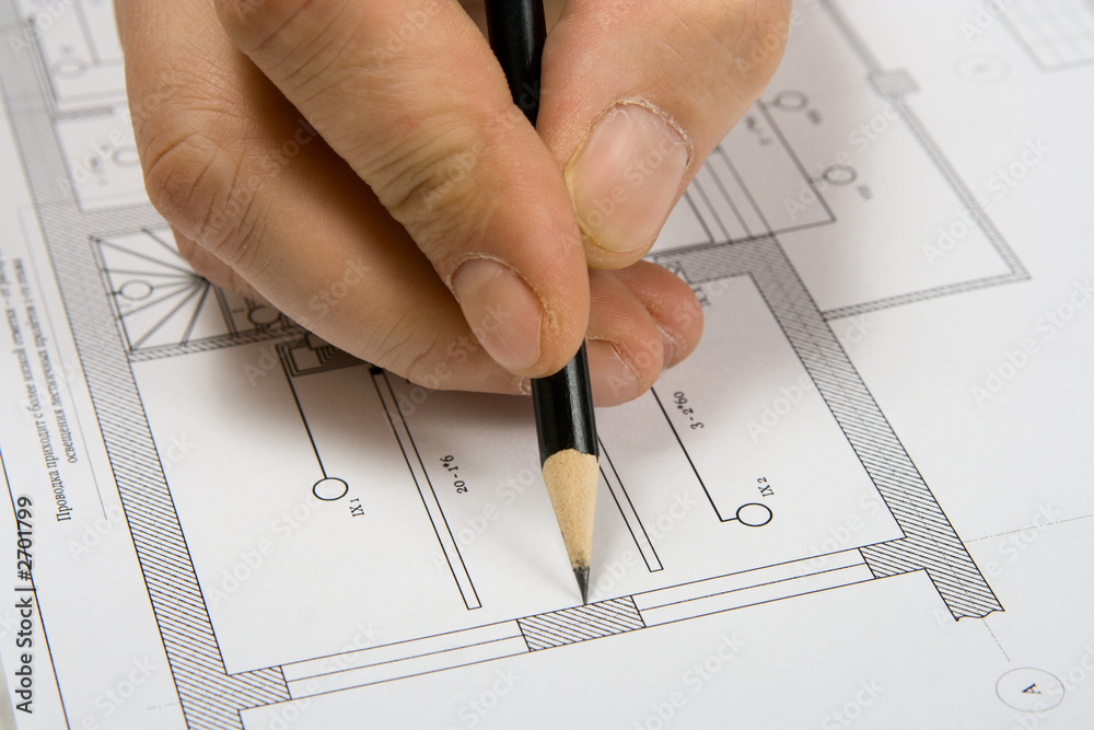 the engineering drawing on a paper. ruler. pencil. the engineering drawing on a paper. ruler. pencil.