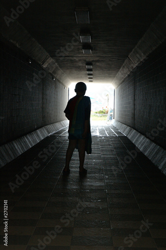 a child in dark tunnel