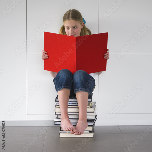 girl reading an exciting book