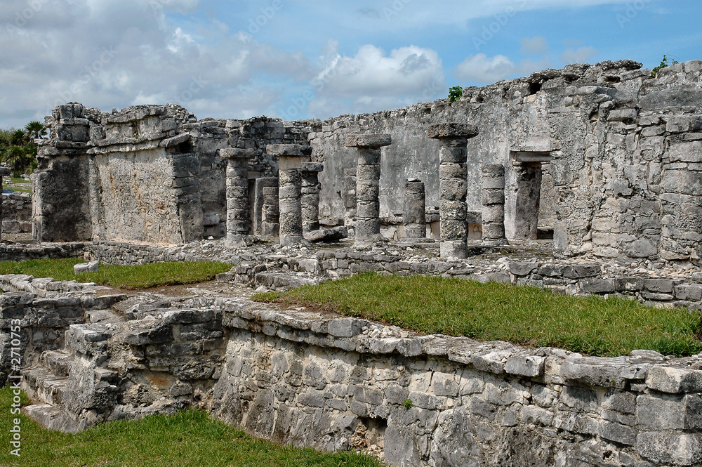columns on ancient building in tulum, mexico