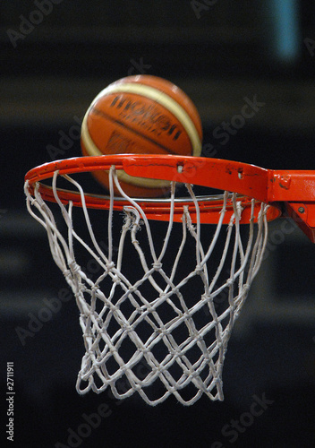 the ball flies to a basketball basket