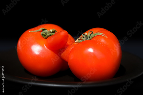 kiss tomatoes on the black