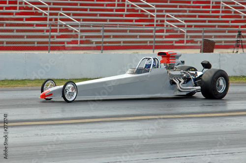 dragster heads down the track photo