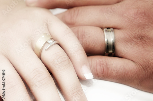 romantic hands with wedding rings