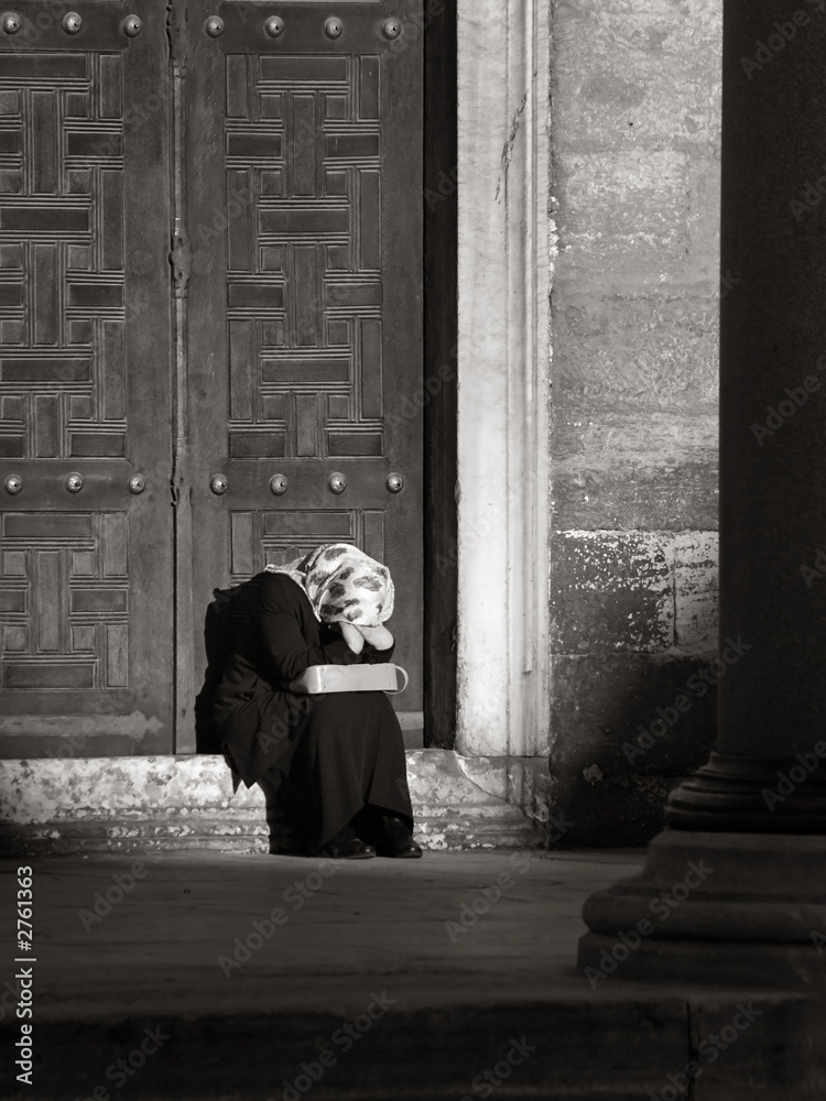 crying woman with headscarf (black and white) crying woman with headscarf (black and white)