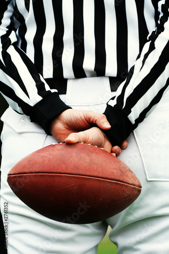 american football referee and ball