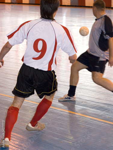 football players attack shot on goal attack