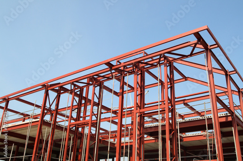 red steel building construction framework.