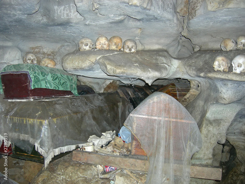 skull and coffins in a toraja cemetary, rantepao, sulawesi islan photo