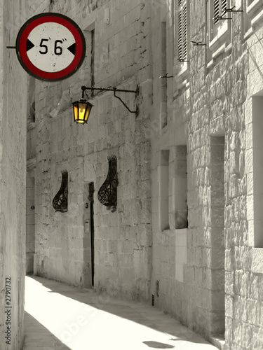 narrow medieval alley photo