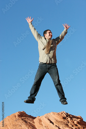 ecstatic businessman jumping