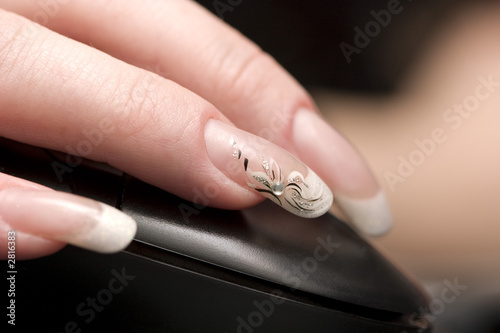 beauty nails, fingers over computer mouse