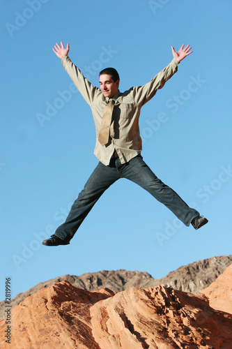 ecstatic businessman jumping