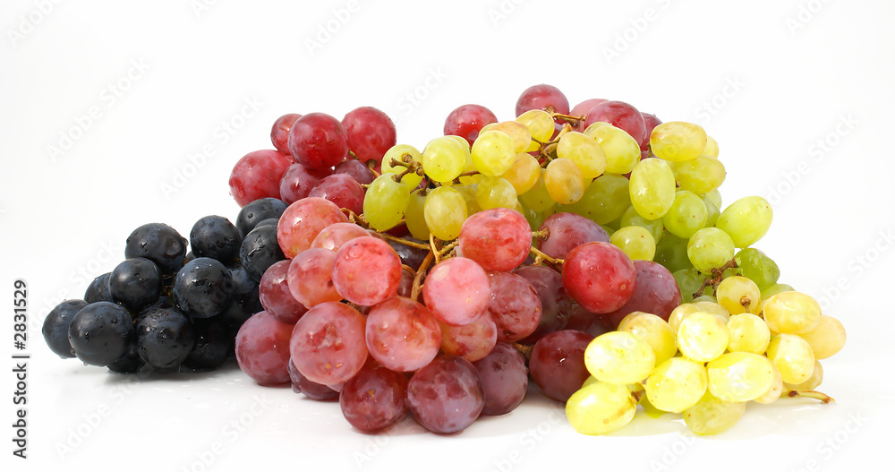 three various grades of grapes