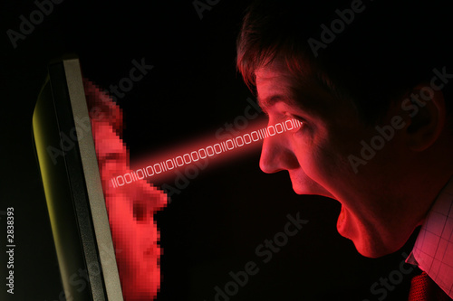 man screaming at own pixelated face with data transfer