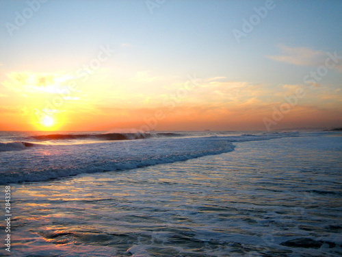 sunset over the ocean in portugal