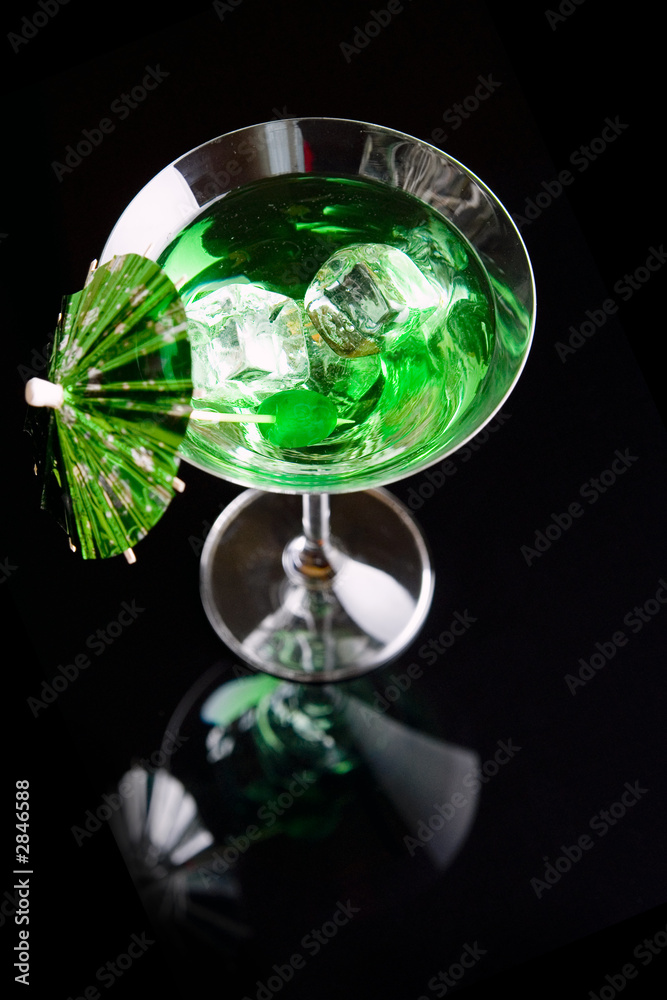 green drink isolated on black background