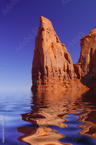 red cliff in indigo water © Stas