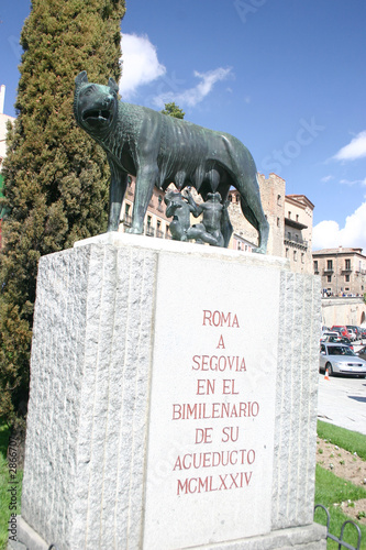 statue of she-wolf and rome and romul in segovia photo