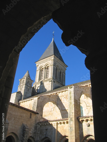 french church with pillars in backlight, france photo